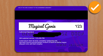 Purple card, back of card at Desert Nights casino, Magical Genie signature, embossed numbers covered, card is on a light brown wooden table,check mark in top right corner to indicate this is a correct copy of back of card